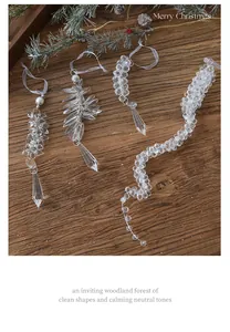 Detailed view of clear acrylic icicle ornaments with bead and crystal drop accents