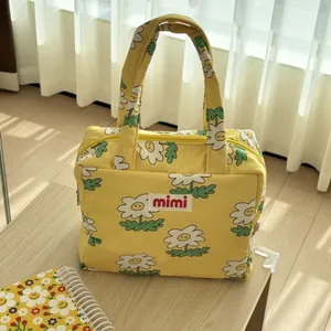 Cute yellow floral tote bag with white daisy pattern and mimi logo for daily storage