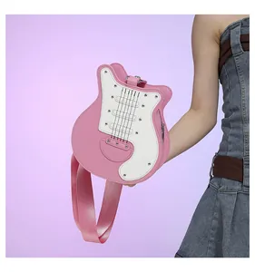 Cute pink and white guitar-shaped crossbody chest bag with stylish metallic studs detail