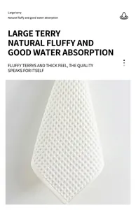 Close-up detail showing the white honeycomb waffle weave of the pure cotton towel