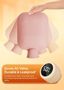 Detailed view of pink hot water bottle with temperature display and spiral valve