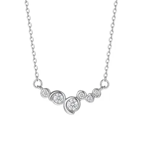 Detailed macro view of S925 sterling silver necklace with sparkling cubic zirconia eye pendant