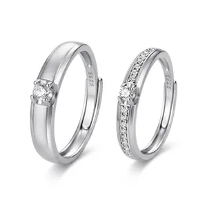 Detailed view of S925 sterling silver couple rings with cubic zirconia stones