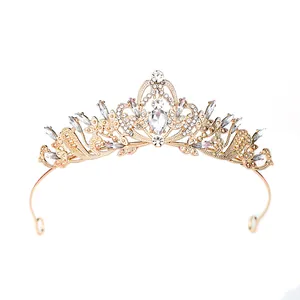 Elegant gold baroque crown with shimmering clear crystals for bridal or birthday celebrations