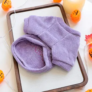 Detailed close-up of purple corduroy pet Halloween sweatshirt showing soft fabric texture