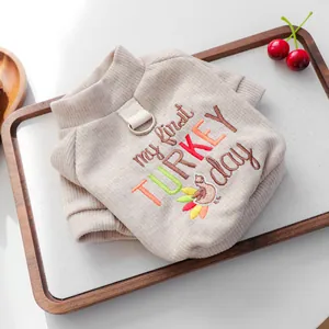 Close-up of pet sweater with my first TURKEY day embroidery and ribbed fabric texture.