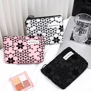 Portable floral pattern makeup pouch set in pink white and black colors