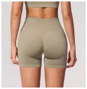 Close-up back view of seamless high-waisted olive green yoga shorts for fitness women
