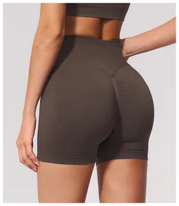 Detail of brown seamless high-waist yoga shorts with scrunch butt lifting effect