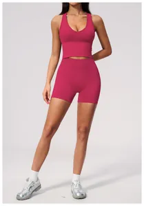 Seamless high-waisted magenta yoga shorts and sports bra set for professional fitness