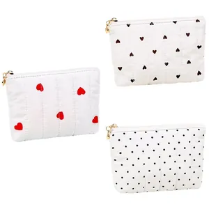 Quilted white pouch set with red heart black heart and polka dot patterns for women