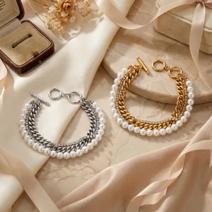 Layered stainless steel bracelet with zircon and pearls featuring an OT clasp