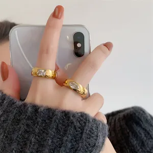 Retro vintage gold plated titanium steel rings with square and oval zirconia stones