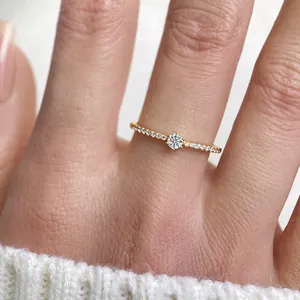 Classic S925 sterling silver gold-plated six-prong zircon ring with side stones for women