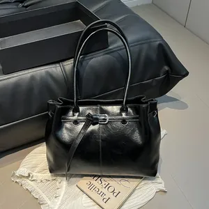 Stylish black minimalist large capacity shoulder bag for women with glossy finish