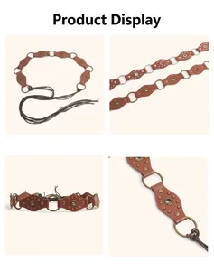 Detailed view of a vintage brown leather belt with metallic rivets and ring connectors.