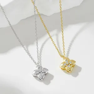 Elegant 925 silver clover pendant necklaces in gold and silver with cubic zirconia stones.