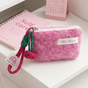 Pink plush mini coin purse with woven lanyard for lipstick and earphone storage pouch