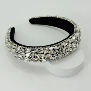 Close-up of Baroque padded hairband featuring sparkling clear rhinestones on black