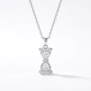 Elegant silver hourglass pendant necklace featuring sparkling micro-pave zircons on a thin chain