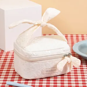Sweet Korean style white floral cosmetic bag with bow handle for girly travel storage