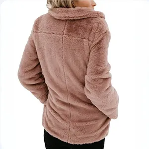 Stylish women's pink fuzzy faux fur jacket featuring a lapel collar and long sleeves