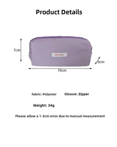 Détails de taille et matière de la trousse violette minimaliste à grande capacité.
