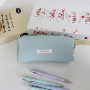 Detail of minimalist light blue macaron pencil case with Mayrabbit label