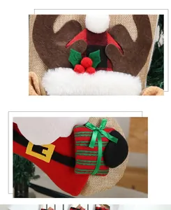 Close-up of burlap Christmas stockings showing 3D reindeer and Santa Claus textures