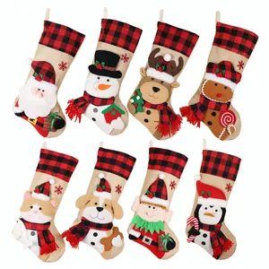Set of 8 burlap Christmas stockings with various holiday character designs
