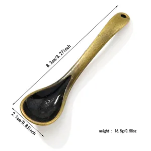 Vintage bronze alloy small spoon pendant charm with dimensions 8.3cm and 16.5g weight