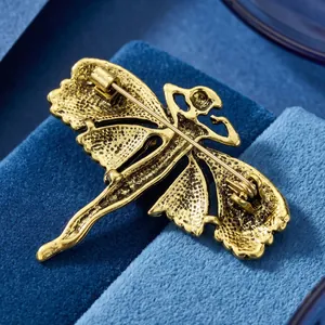 Detailed macro view of the vintage golden angel brooch back with secure pin clasp