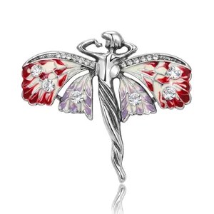 Vintage angel wing brooch with colorful enamel and sparkling rhinestones in silver alloy