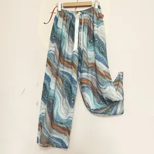 Breathable wide-leg pajama pants with abstract blue and brown marble pattern