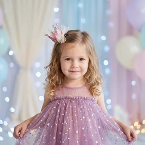 Close-up of a young girl wearing a sparkling pink sequin crown hair clip for party