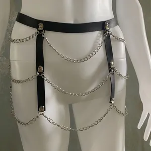 Black leather waist chain harness with triple silver metal layers on white mannequin.