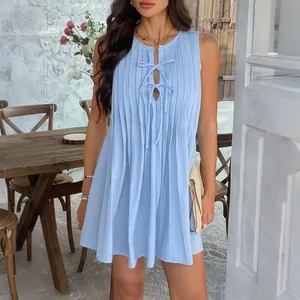 Light blue pleated sleeveless mini dress with tie-neck detail for summer vacation style