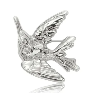 Élégante broche colibri en métal liquide argenté avec finition miroir polie de luxe