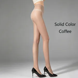 Side view detail of coffee color sheer pantyhose on a model wearing black heels