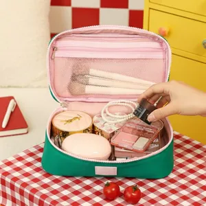 Large capacity macaron green cosmetic bag with pink lining and zip mesh pocket