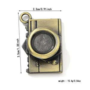 Vintage antique bronze alloy camera pendant showing dimensions and weight specifications