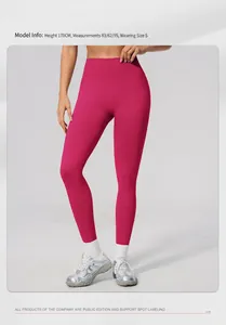 Detail shot of fuchsia seamless high waist yoga pants showing the slim fit and fabric texture