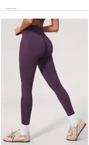 Close-up of plum purple seamless yoga leggings showing peach butt lifting effect