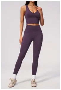 Detailed view of seamless purple yoga set featuring high-waist tummy control leggings