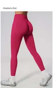 Back view of seamless high waist peach butt yoga pants in vibrant raspberry red.