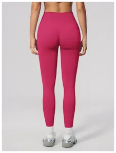 Detailed back view of magenta high-waist seamless yoga leggings with peach lift effect