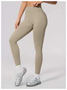 Professional seamless high-waisted peach lift yoga pants in khaki for fitness training