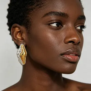 Contemporary gold and silver mixed-metal molten lava irregular abstract stud earrings