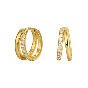 Detailed view of S925 gold-plated double hoop earrings with sparkling cubic zirconia