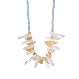 Handmade natural stone necklace featuring clear crystal shards and light blue beads